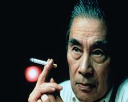 Burt Kwouk smoking